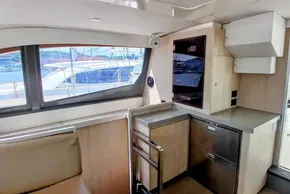 Interior of 2017 Leopard 48 yacht with modern kitchen and large windows.