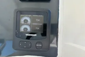 Yanmar engine display on 2024 Leopard 40 Powercat showing boost pressure and coolant temperature.
