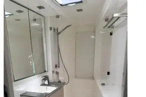 Modern bathroom in 2021 Leopard 50 yacht, featuring sleek fixtures and spacious design.