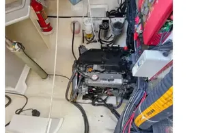 Engine room of a 2019 Leopard 50 yacht with visible wiring and equipment.