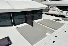 2025 Robertson and Caine Leopard 46 Powercat deck with cushioned seating and sleek design.