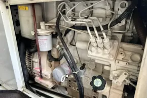 Engine compartment of a 2022 Leopard 53 Powercat, showcasing filters and wiring.