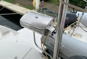 Stainless steel grill on a 2021 Leopard 45 yacht deck, with Yamaha motor in background.