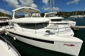 2025 Robertson and Caine Leopard 46 Powercat docked at marina under blue sky.