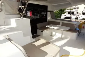 Spacious outdoor seating area on a 2020 Lagoon 42 catamaran yacht.