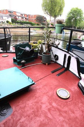 bow section of boat with winch and front hatch