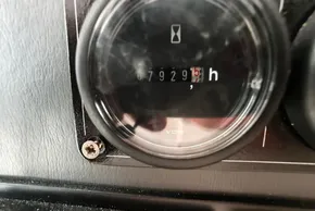 Close-up of a Leopard 50 hour meter showing 7929.5 hours, 2020 model.