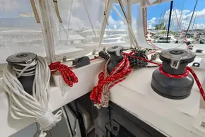 Sailing yacht Leopard 50, 2020 model, with ropes and winches on deck in a marina.