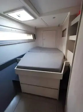 Modern bedroom interior of 2017 Leopard 51 Powercat yacht.