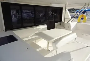 2017 Leopard 43 Powercat yacht interior with white seating and table.
