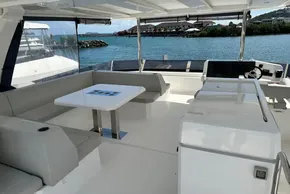 2025 Robertson and Caine Leopard 46 Powercat interior with seating and ocean view.