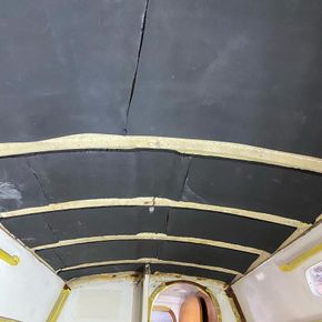 Headlining insulation to underdeck