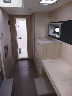 Interior of 2021 Leopard 40 yacht with modern wood finish and compact design.