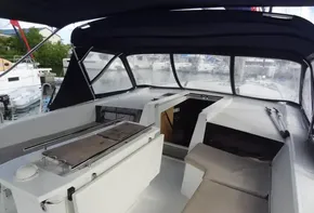 Beneteau Oceanis 46.1 2020 cockpit with seating and covered helm station.