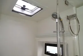Leopard 45 yacht bathroom with skylight and modern shower, 2017 model.