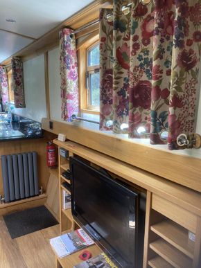 Custom made curtains and blinds add colour