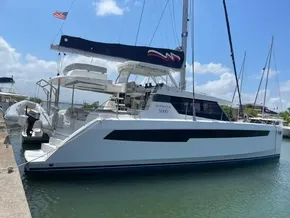 2020 Leopard 50 catamaran docked at a marina on a sunny day.