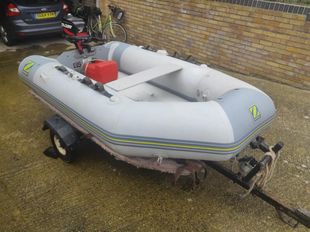 inflatable RIB + 5HP outboard + trailer