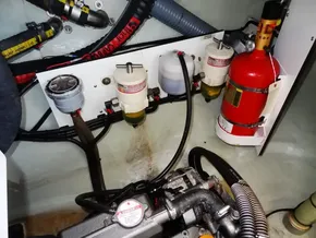 Engine room of a 2021 Leopard 40 with filters and fire extinguisher.