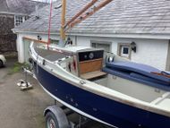 1990 Cornish Shrimper 19 with road trailer and tender.