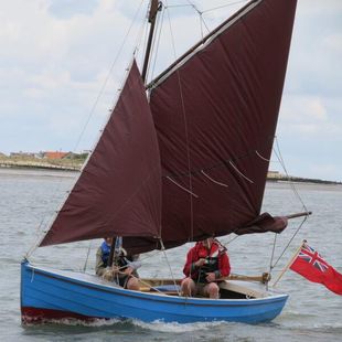 Gaff rigged open boat