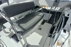 Helm station of 2022 Leopard 45 catamaran with dual steering wheels and seating.