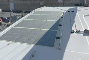 Solar panels on 2017 Lagoon 42 catamaran deck, docked in marina.