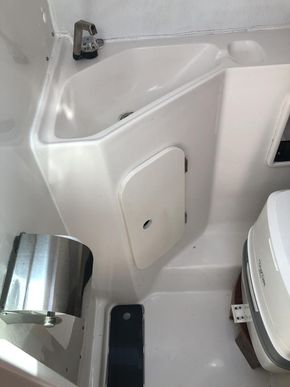 Separate heads with wash basin and porta potti