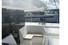 Modern 2025 Leopard 46 yacht interior with sleek seating and glossy finishes.