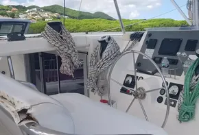 Leopard 48 yacht cockpit, 2017 model, featuring steering wheel and navigation instruments.