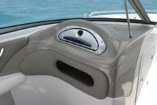 Crownline Bowrider 220 LS - Passenger side console with convenient storage compartment and standard glare resistant finish