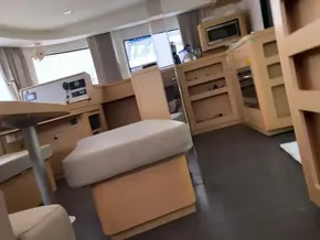 Interior of 2020 Lagoon 42 catamaran with modern furnishings and ample natural light.