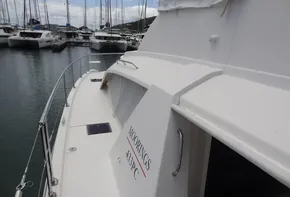 2020 Leopard 43 Powercat docked at marina with other boats.