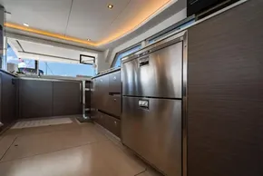 Modern kitchen interior on a 2022 Leopard 50 yacht, featuring stainless steel appliances.