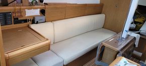 port settee in extended mode and table protector