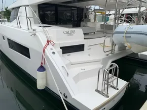 2021 Leopard 45 yacht docked, featuring spacious deck and modern design.