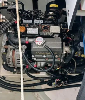 Engine compartment of a 2021 Leopard 40, showcasing mechanical components and wiring.