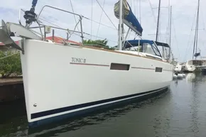 2013 Beneteau Oceanis 41 sailboat docked, featuring sleek design and modern rigging.