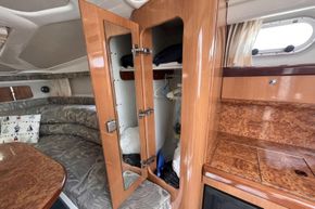 Sealine S28 - wardrobe between galley and cabin