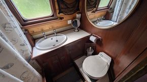 storage space under the sink; pump out toilet