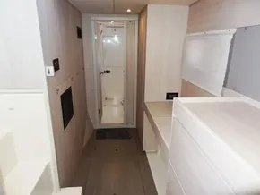 Interior hallway of 2017 Leopard 43 Powercat with light wood finish and modern design.