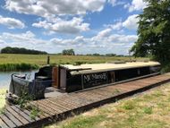 One-of-a-kind 60×12 widebeam is beautiful, spacious home on the water