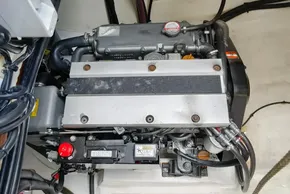 Engine compartment of a 2020 Leopard 50 yacht, showcasing mechanical components and wiring.