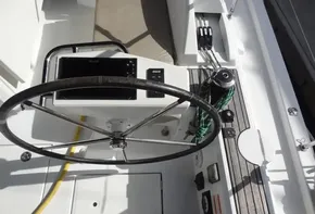 Beneteau Oceanis 46.1 2020 yacht cockpit with steering wheel and navigation instruments.