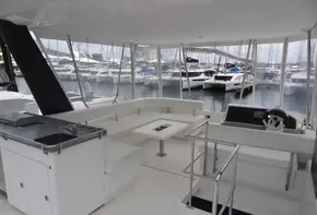 Spacious deck of 2020 Leopard 43 Powercat with marina view.
