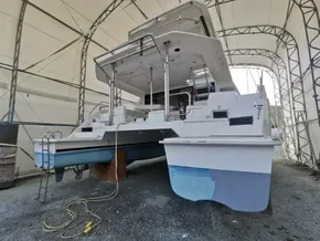 2017 Leopard 43 Powercat in dry dock under a canopy.