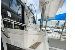 2019 Leopard 50 yacht interior with stairs and steering wheel.