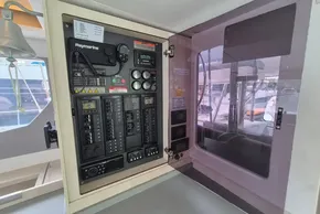Electrical control panel inside a 2021 Leopard 45 catamaran, featuring Raymarine equipment.