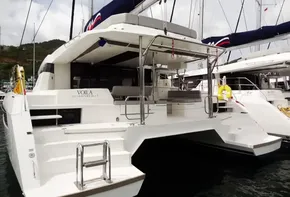 Leopard 50 catamaran, 2020 model, docked at marina with spacious deck and seating area.