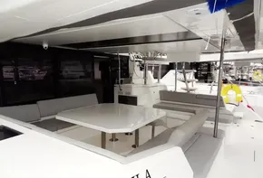 Leopard 50 yacht 2020 model with spacious outdoor seating and dining area, named Voila.